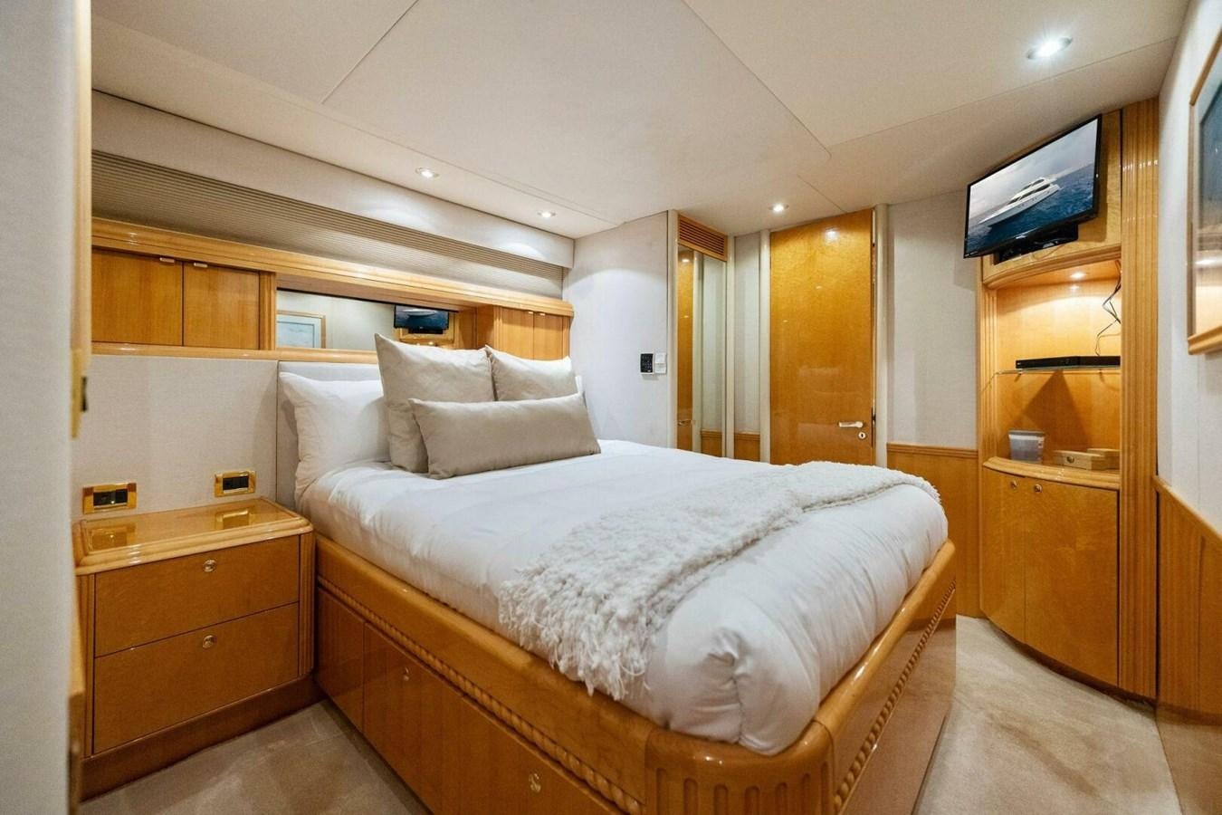 a bed in a room aboard NORDLYS Yacht for Sale