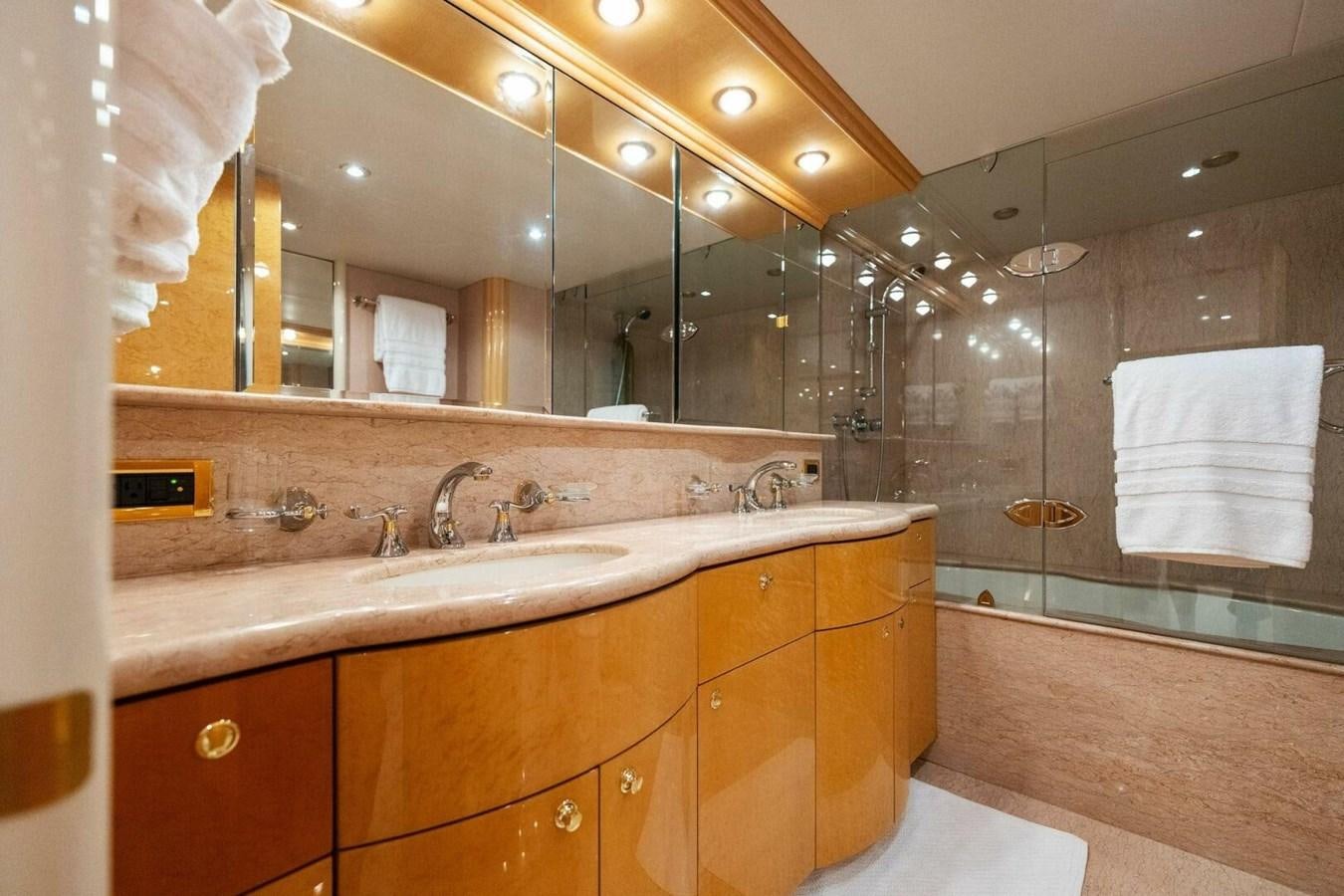 a bathroom with a large mirror aboard NORDLYS Yacht for Sale