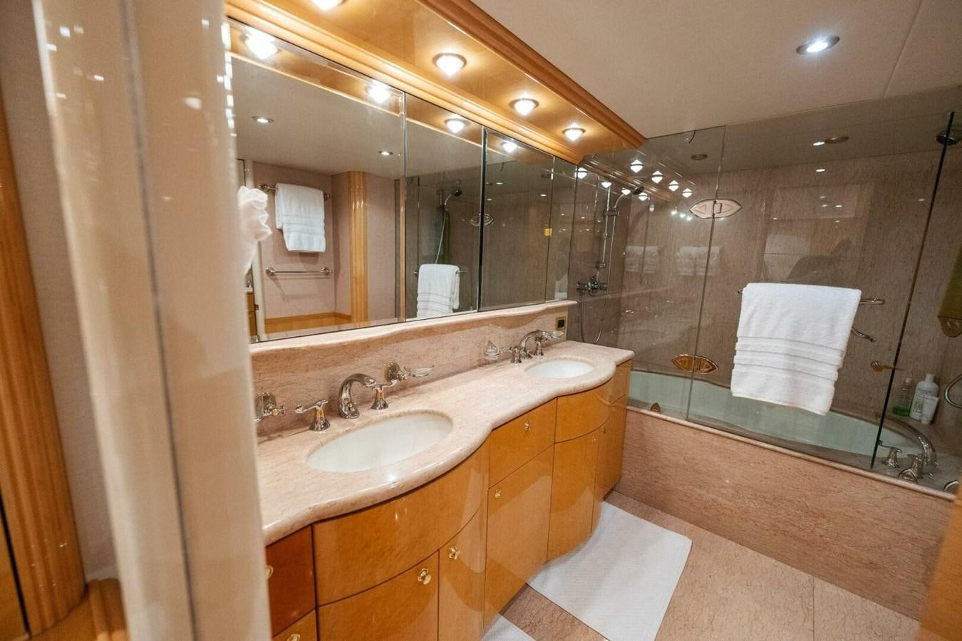 a bathroom with a large mirror aboard NORDLYS Yacht for Sale