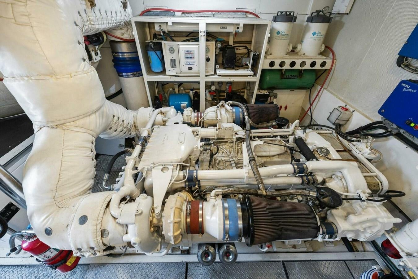 a person in a white lab coat aboard NORDLYS Yacht for Sale