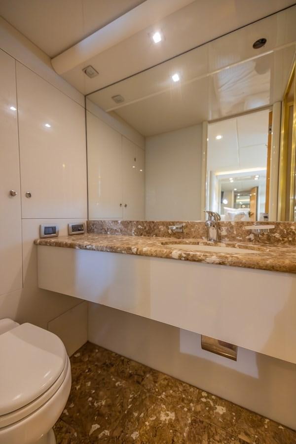 a bathroom with a large marble counter aboard BOURBON LEGEND Yacht for Sale