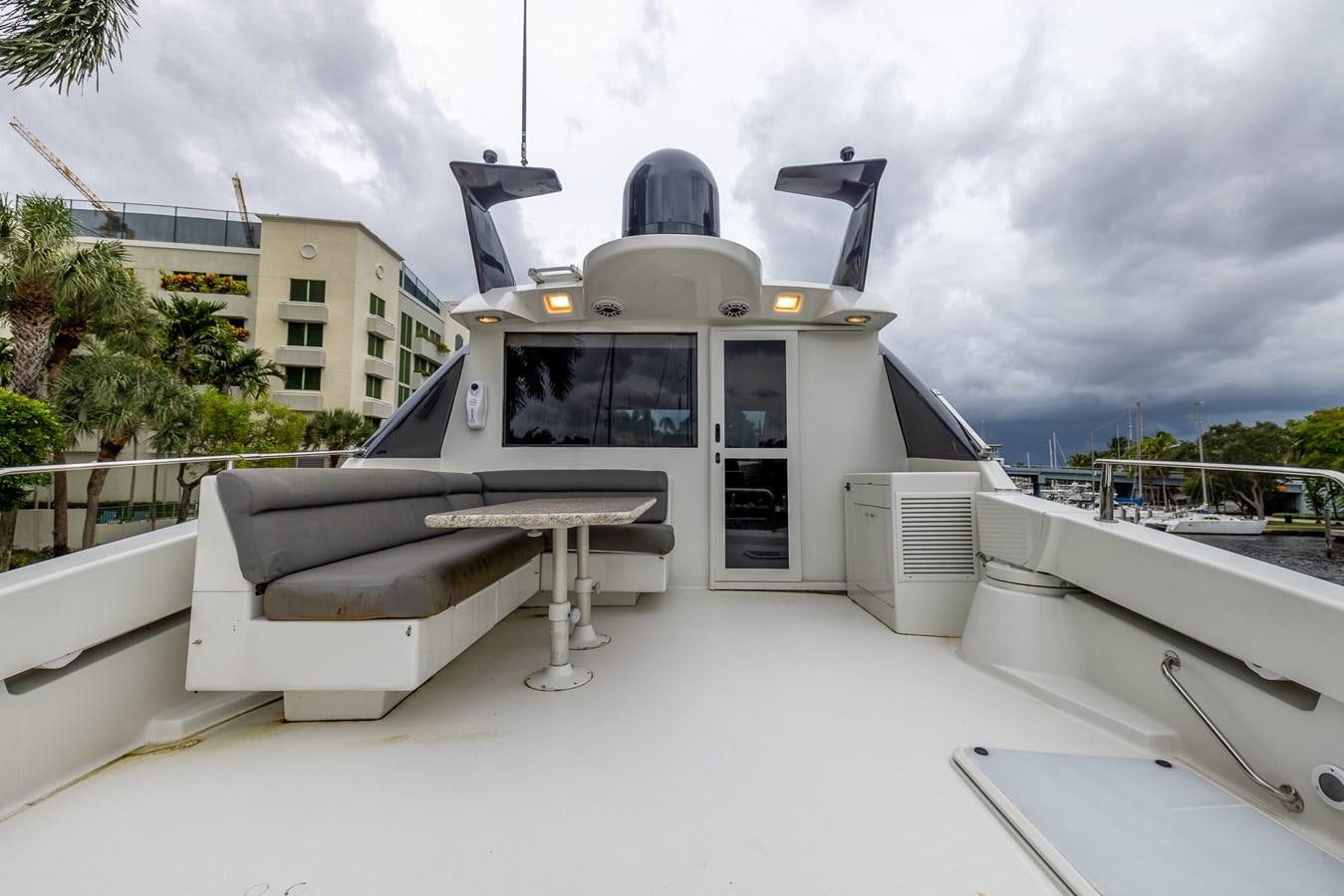 a white building with a large satellite dish on top aboard BOURBON LEGEND Yacht for Sale