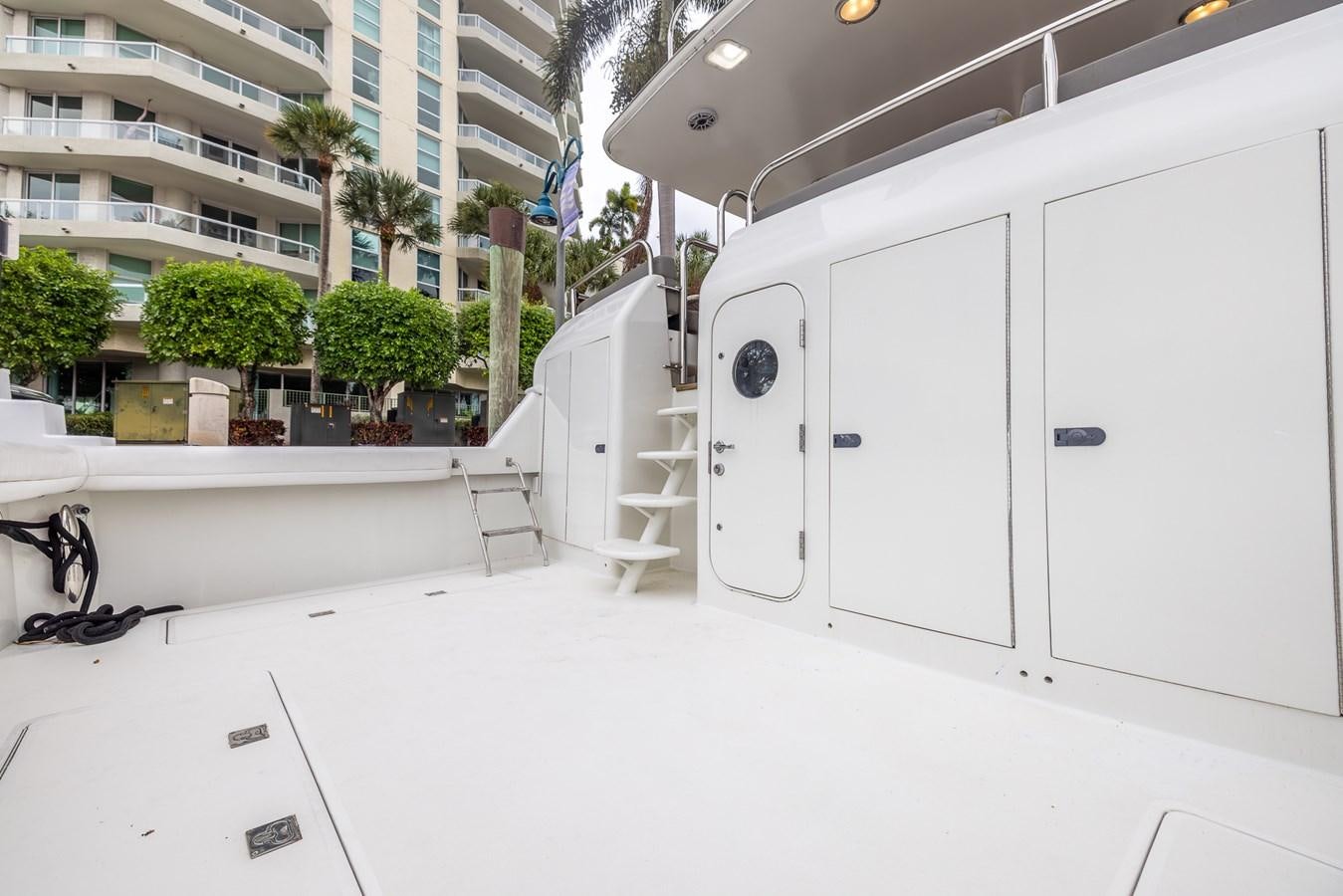 a white room with a white wall and a white door aboard BOURBON LEGEND Yacht for Sale