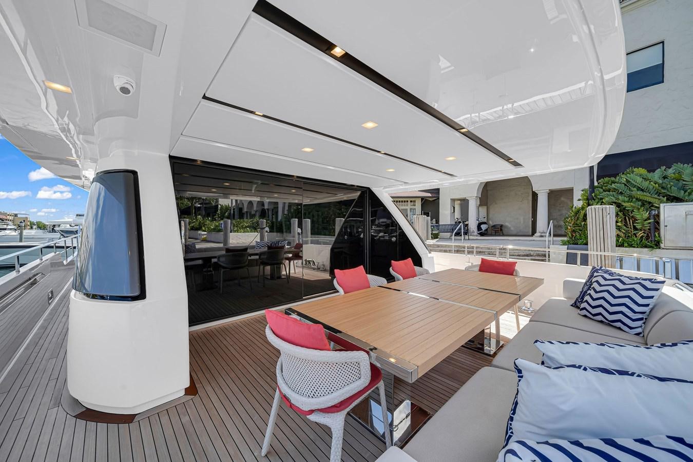 a room with a table and chairs aboard SL86/728 Yacht for Sale