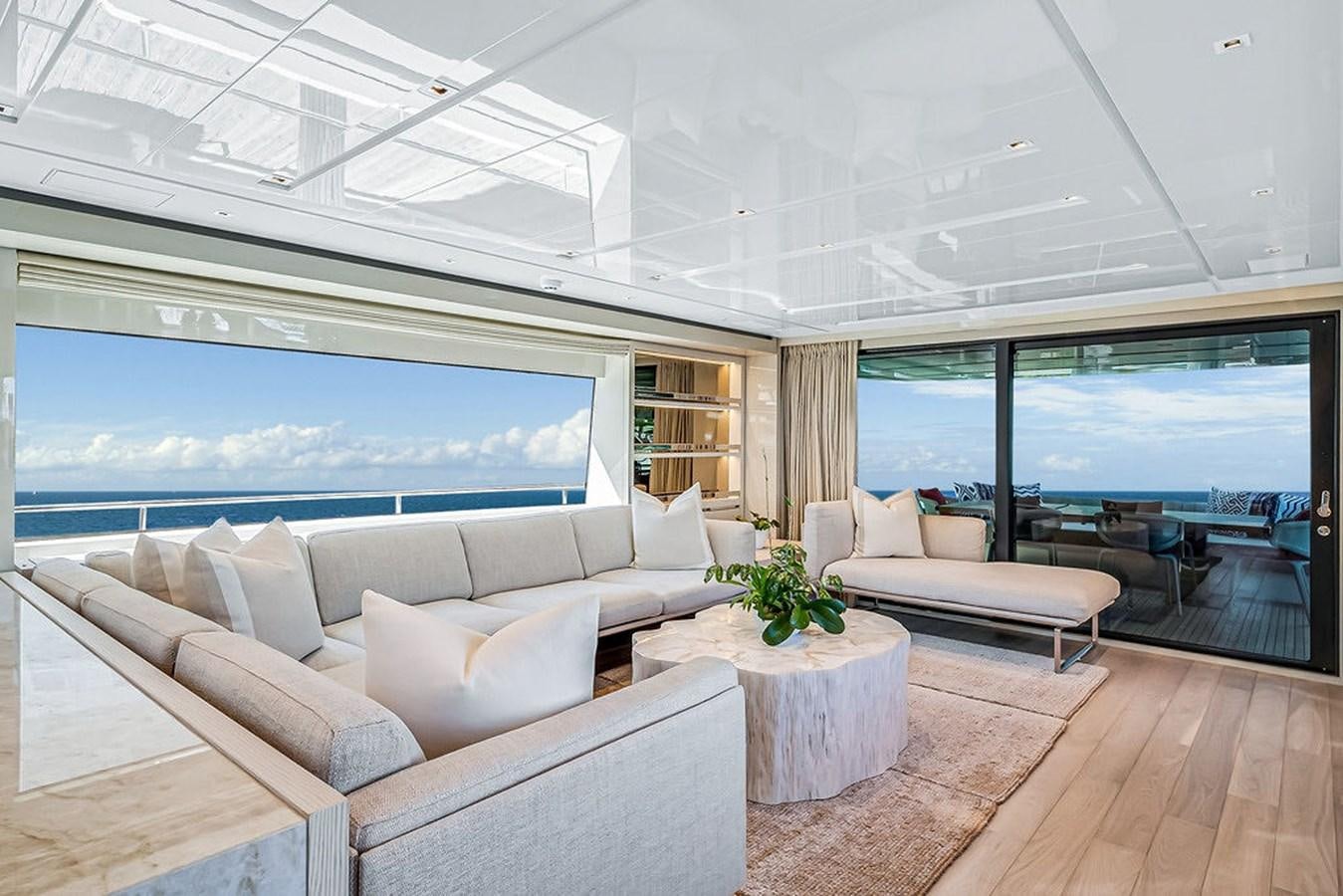 a living room with a large window aboard SL86/728 Yacht for Sale