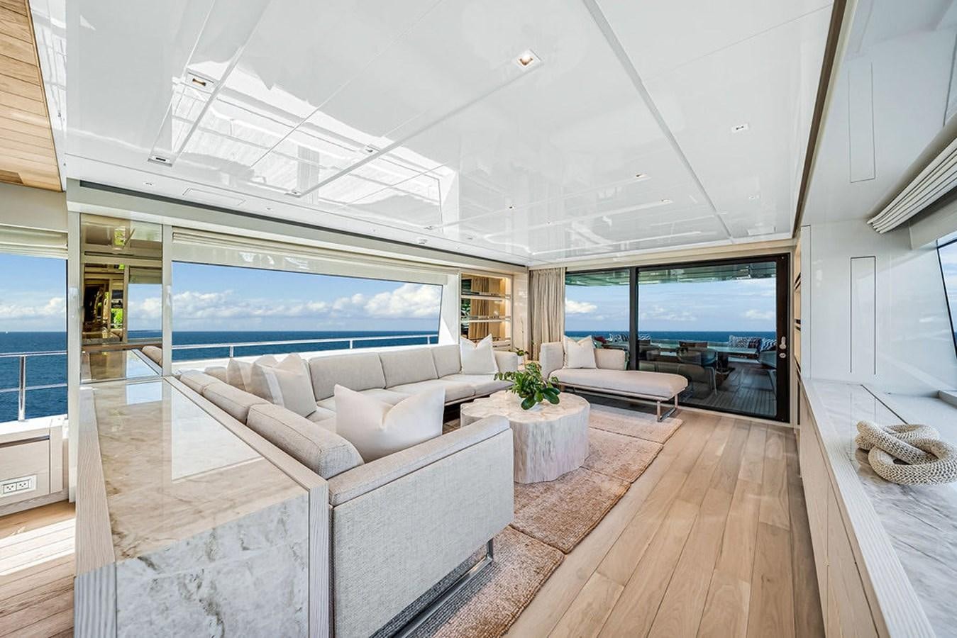 a living room with a large window aboard SL86/728 Yacht for Sale