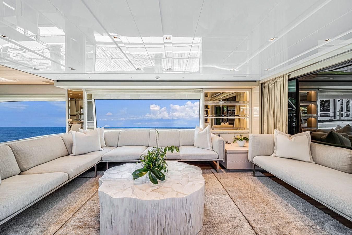 a living room with a large window aboard SL86/728 Yacht for Sale