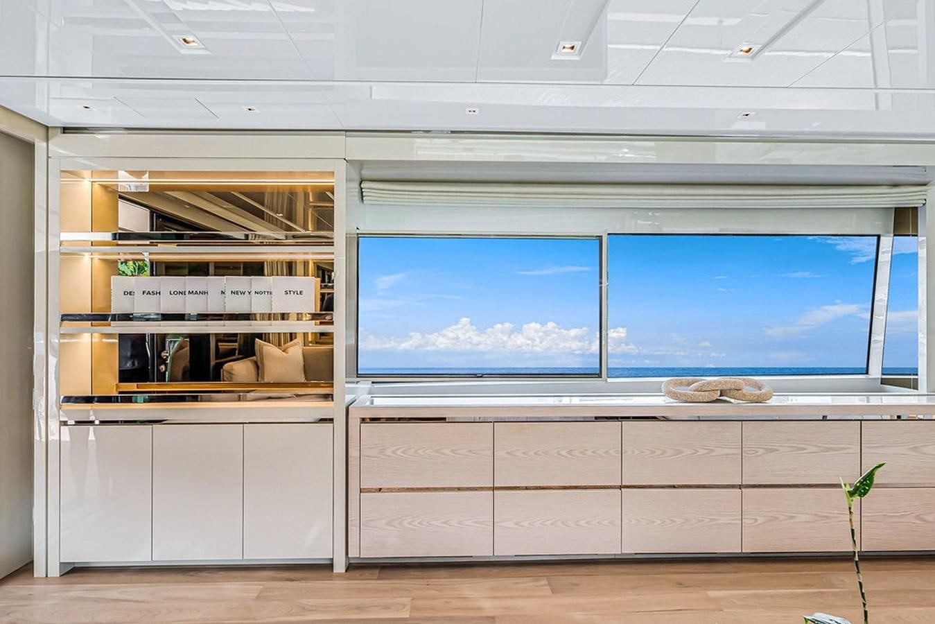 a room with a large window aboard SL86/728 Yacht for Sale