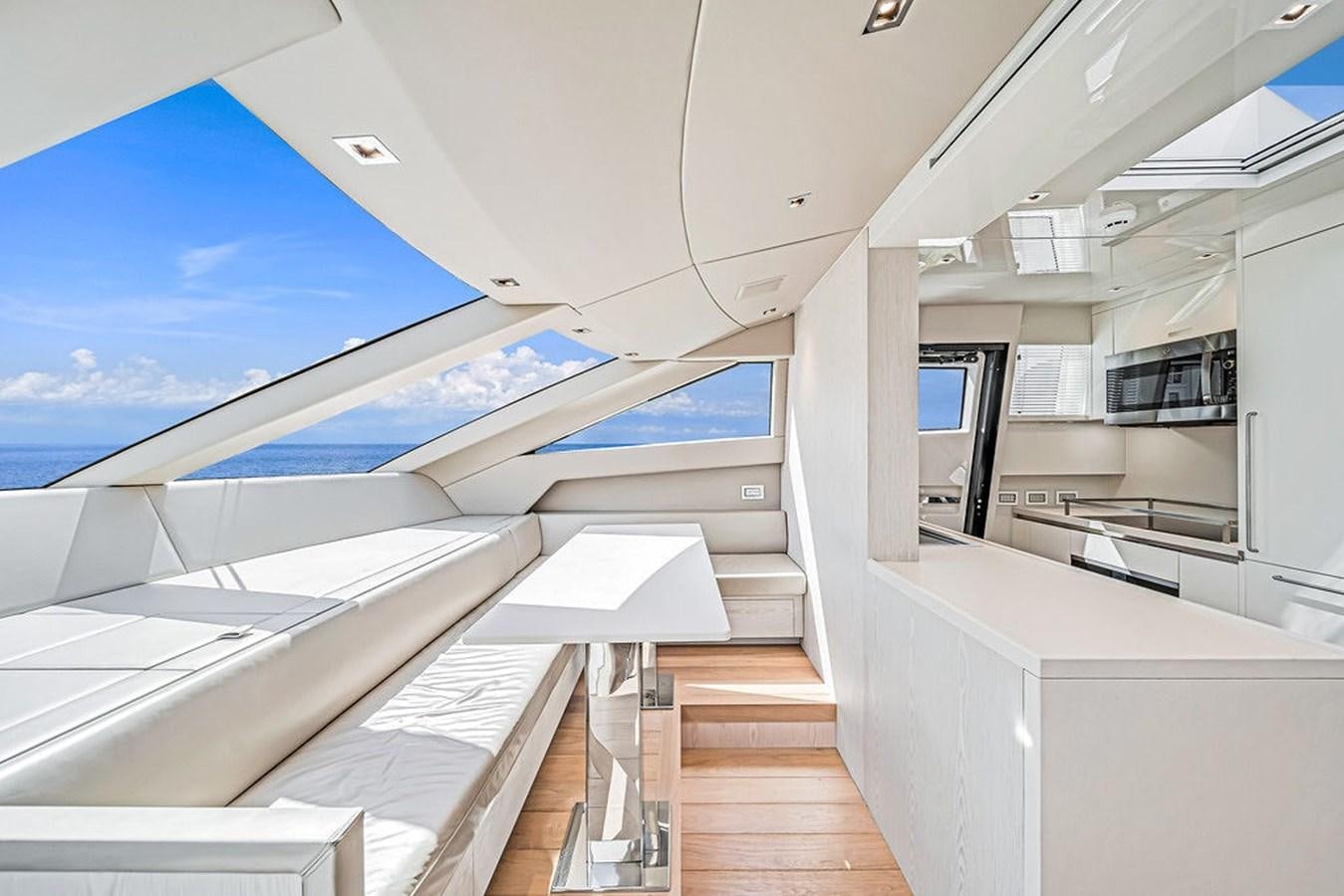 a room with a view of the ocean and the deck aboard SL86/728 Yacht for Sale