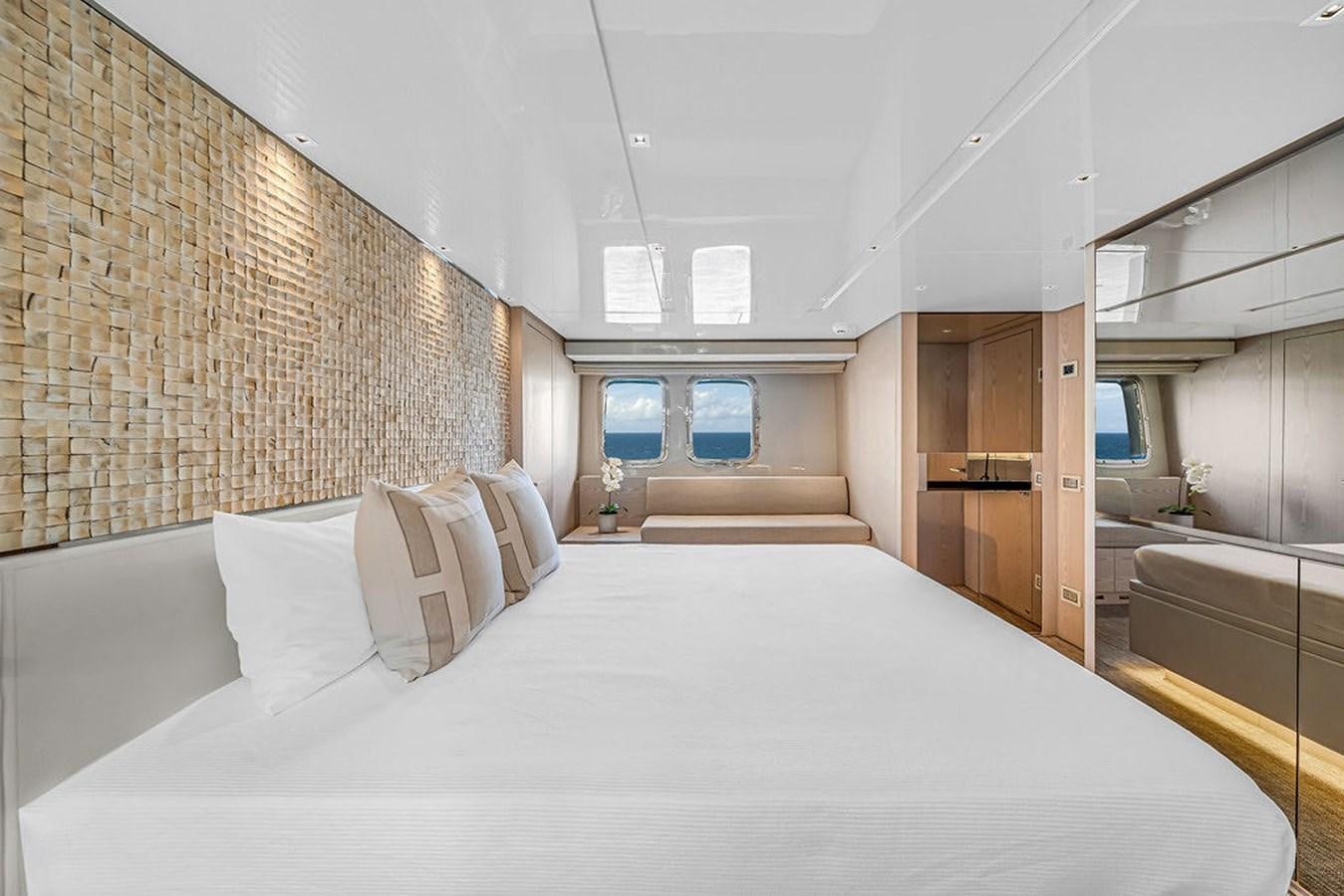 a large bed in a room aboard SL86/728 Yacht for Sale