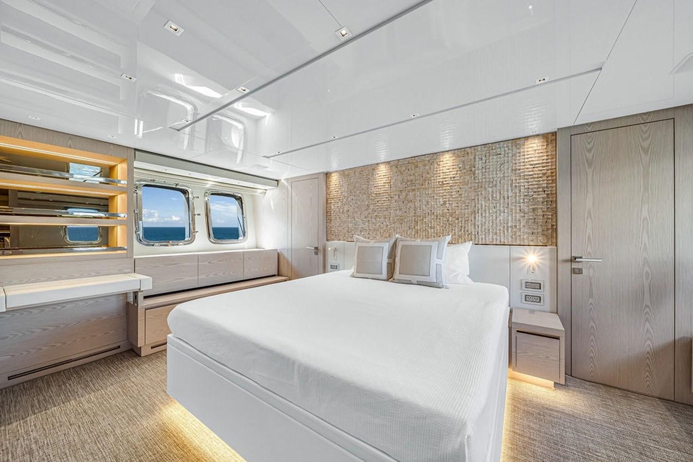 a room with a bed and a window aboard SL86/728 Yacht for Sale