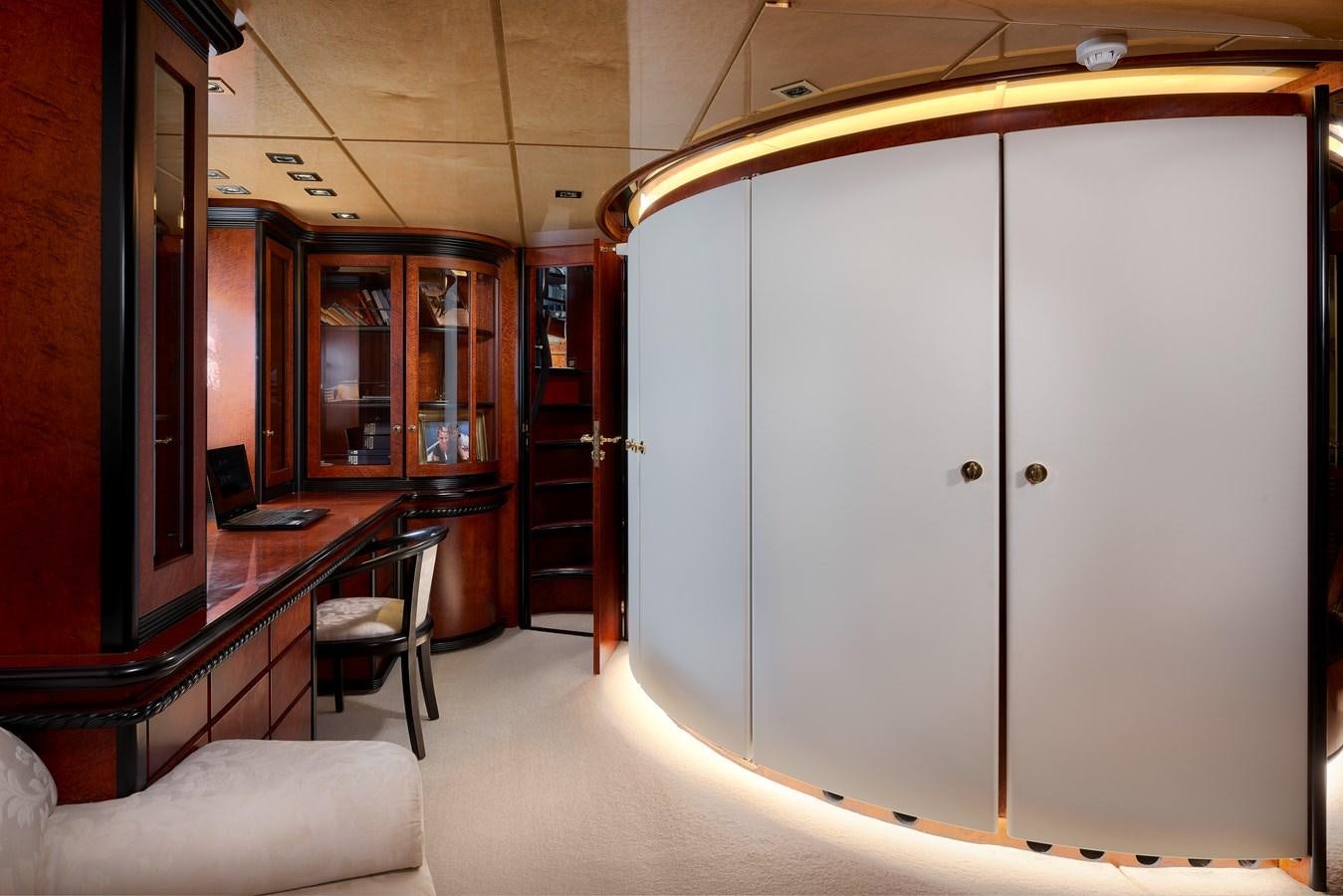 a room with a table and chairs aboard LADY SUNSHINE Yacht for Sale