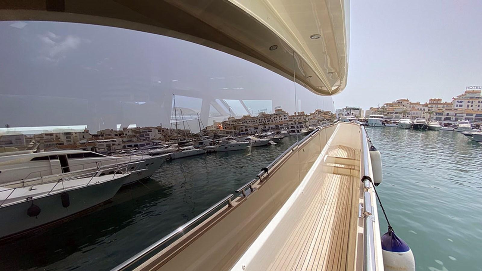 a long dock with boats aboard CAPPUCCINO Yacht for Sale
