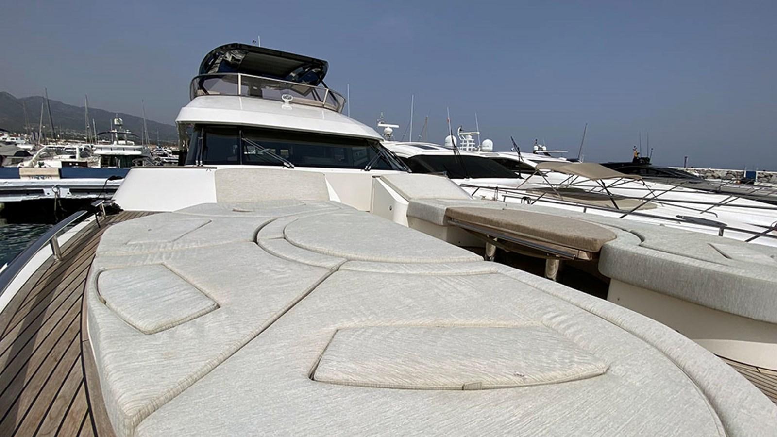 a boat docked at a pier aboard CAPPUCCINO Yacht for Sale