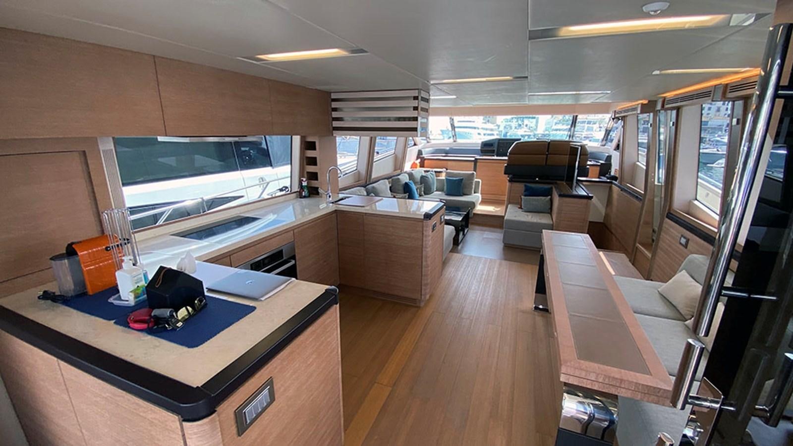 a room with a table and chairs aboard CAPPUCCINO Yacht for Sale