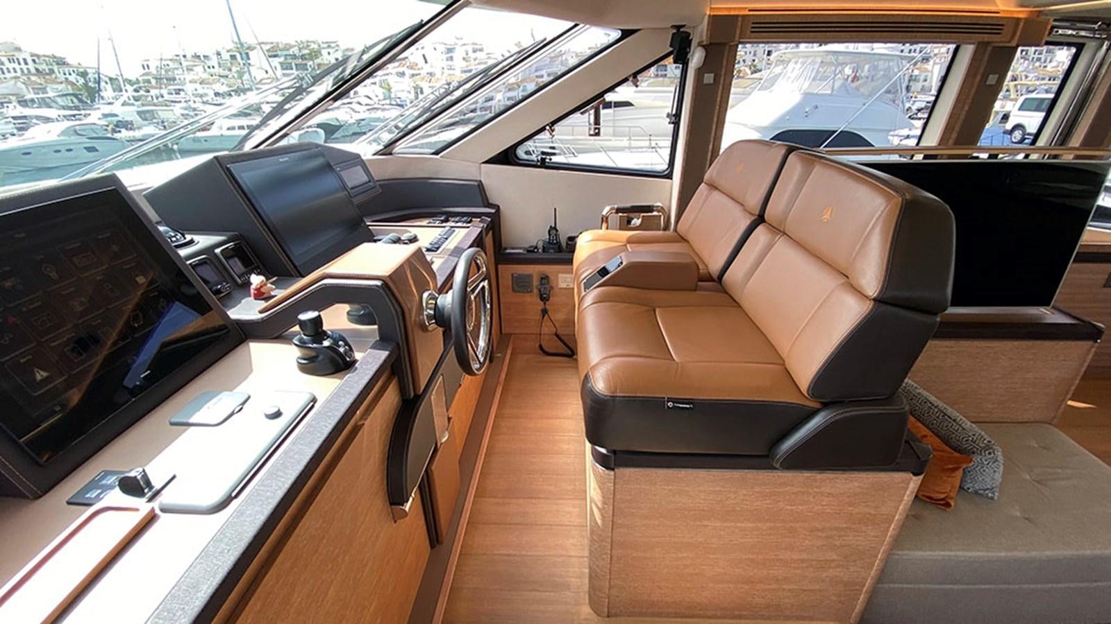 a room with a couch and a computer aboard CAPPUCCINO Yacht for Sale