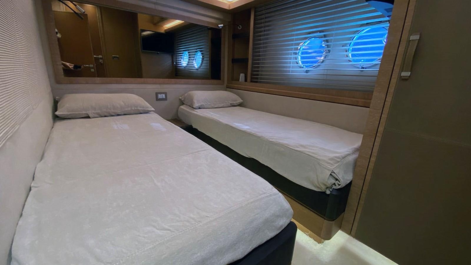 a couple of beds in a room aboard CAPPUCCINO Yacht for Sale