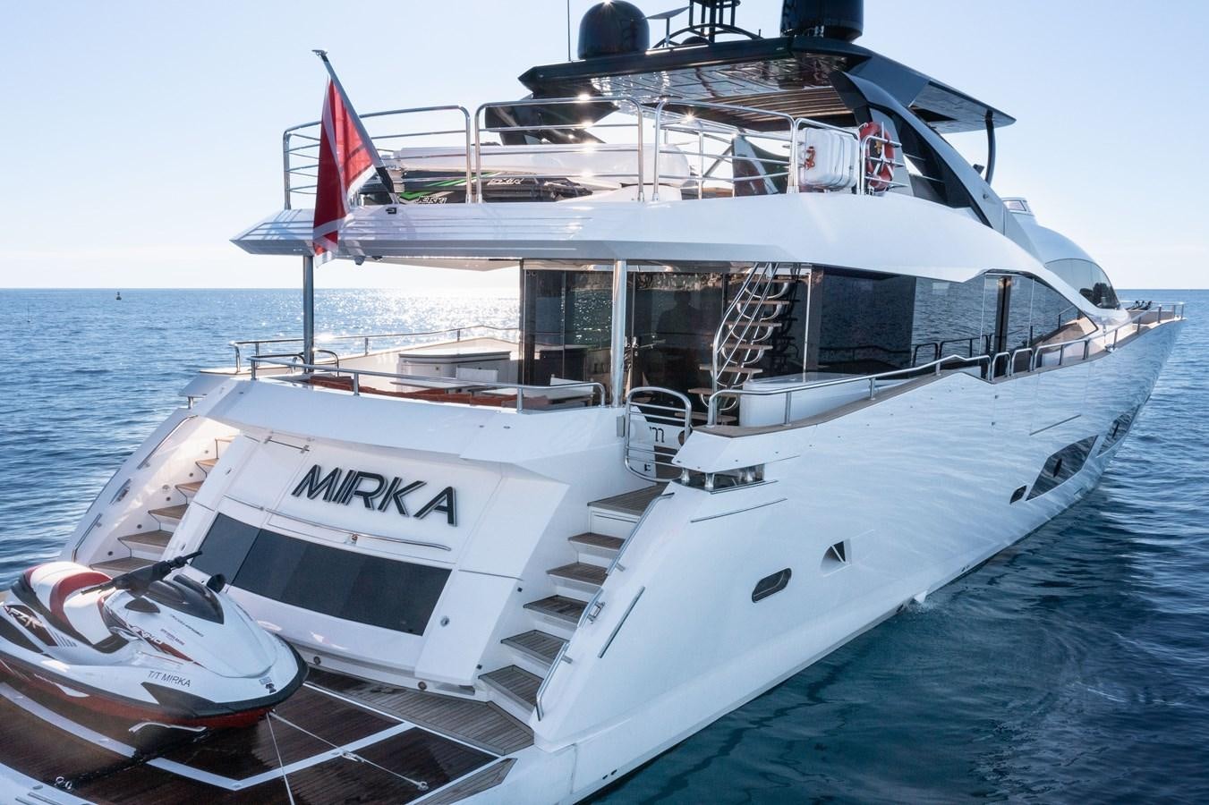 a boat with a flag on the front aboard MIRKA Yacht for Sale