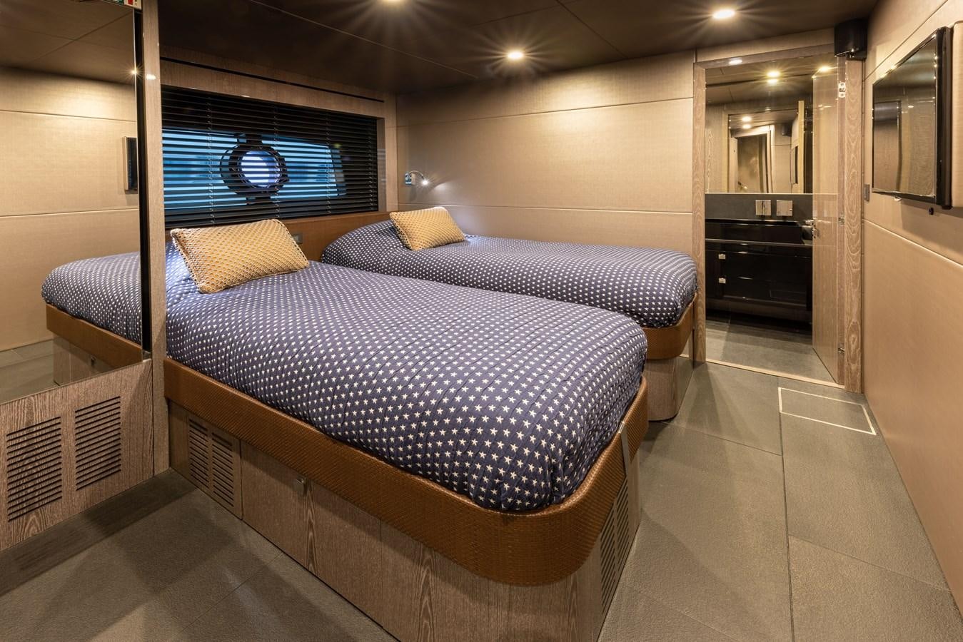 a bed in a room aboard MIRKA Yacht for Sale