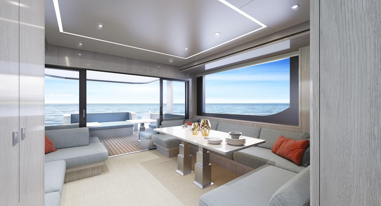 a room with a table and couches aboard ADVENTURE 30 Yacht for Sale