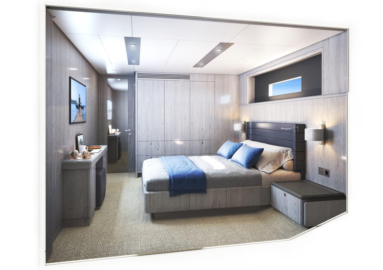 a bedroom with a bed and a tv aboard ADVENTURE 30 Yacht for Sale
