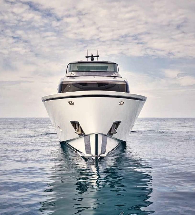 a white boat in the water aboard SX88/118 Yacht for Sale