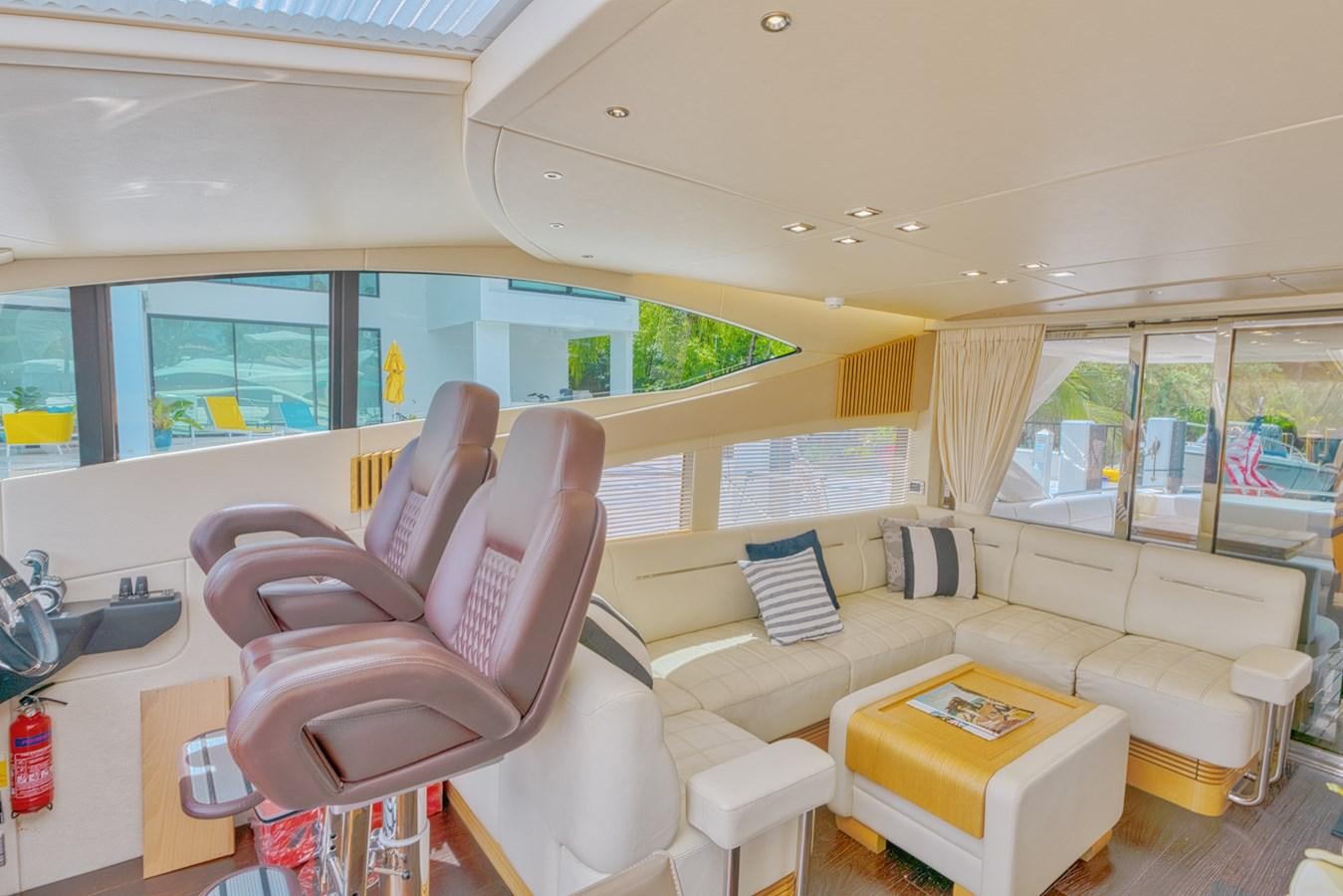 a room with a couch and a table and chairs aboard MISS INGRID Yacht for Sale