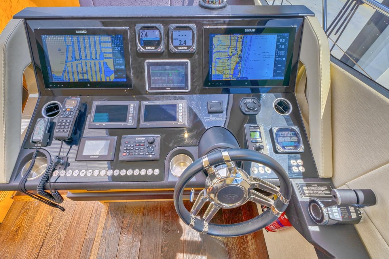 a computer with a screen and a pair of headphones aboard MISS INGRID Yacht for Sale