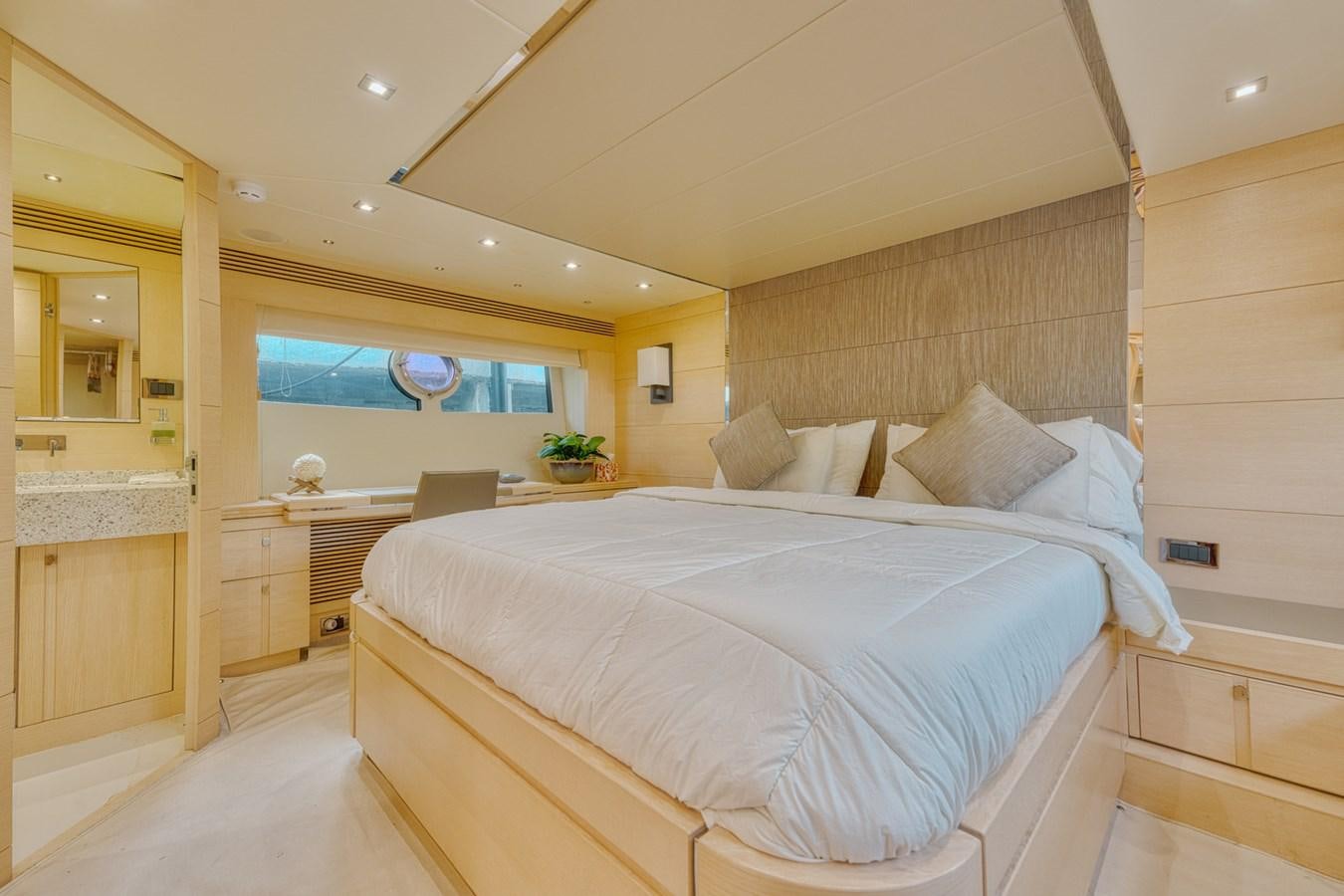 a large bedroom with a large bed aboard MISS INGRID Yacht for Sale