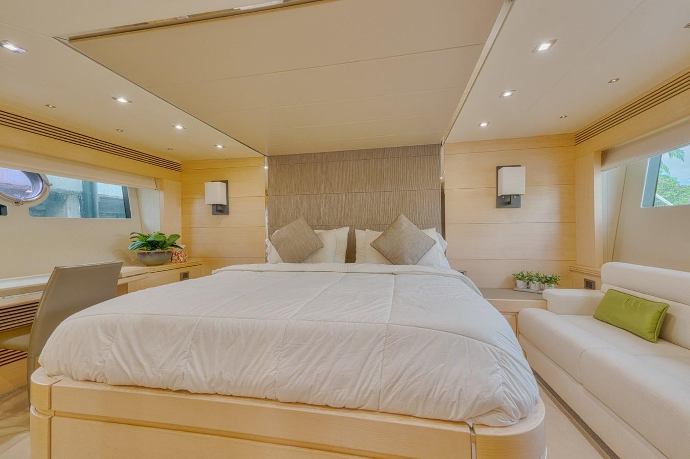 a room with a bed and a couch aboard MISS INGRID Yacht for Sale