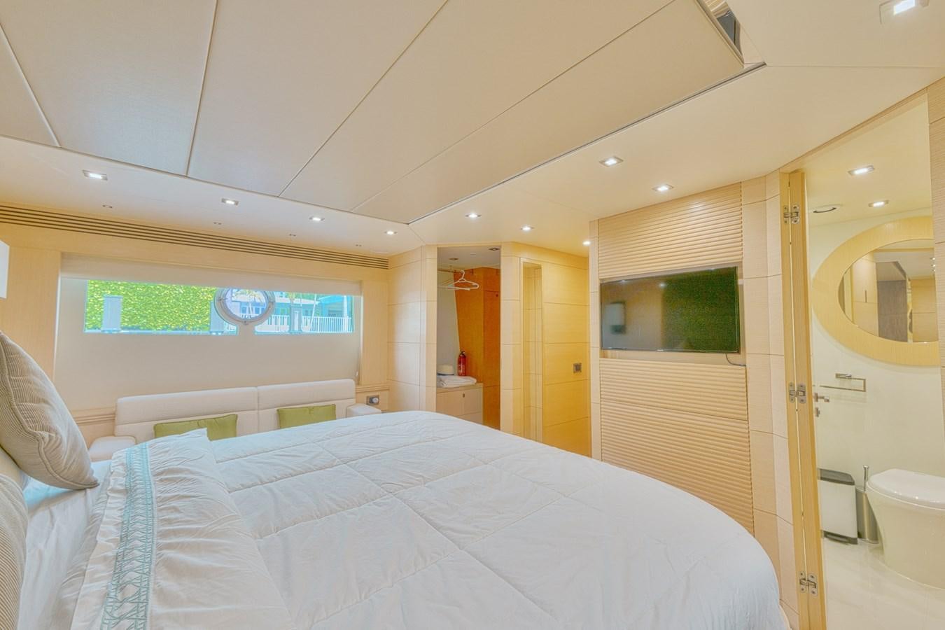 a bed in a room aboard MISS INGRID Yacht for Sale