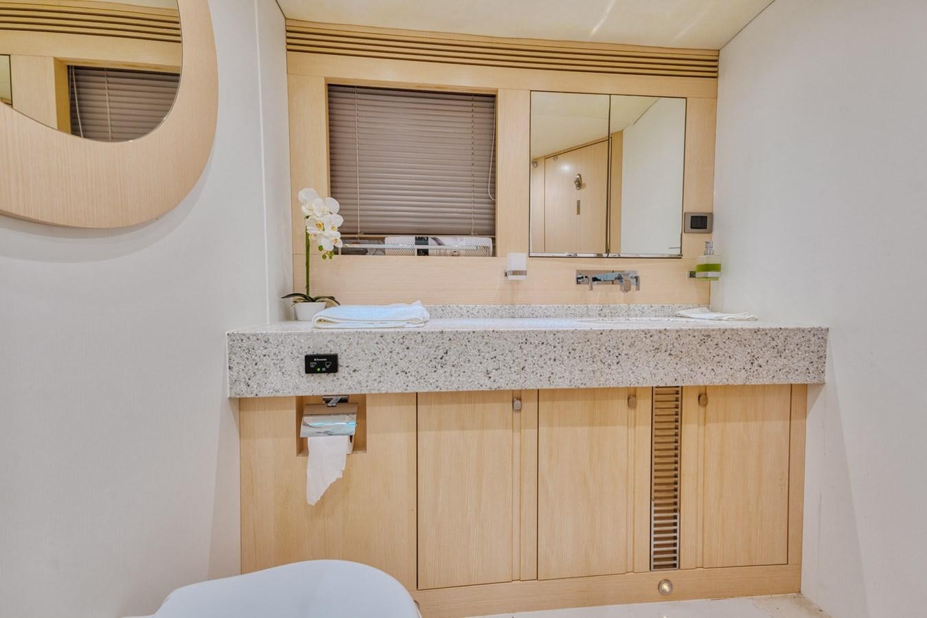 a bathroom with a marble counter top aboard MISS INGRID Yacht for Sale