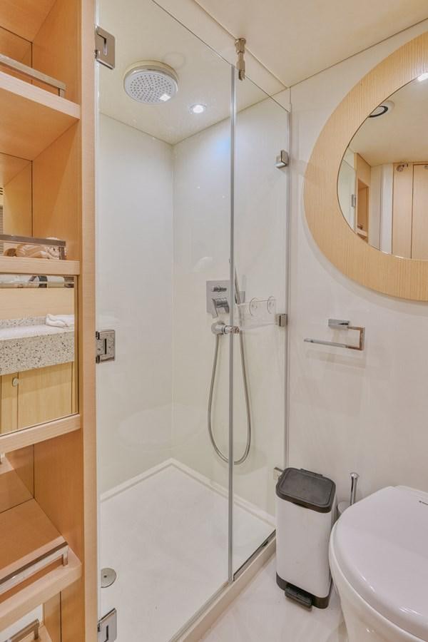 a bathroom with a shower unit aboard MISS INGRID Yacht for Sale
