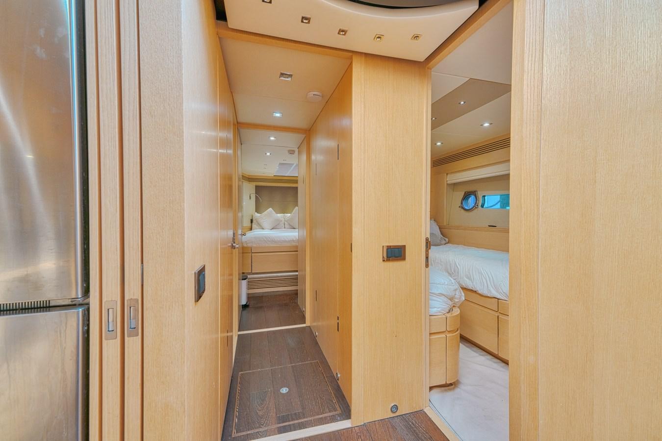 a room with a bed and a closet aboard MISS INGRID Yacht for Sale