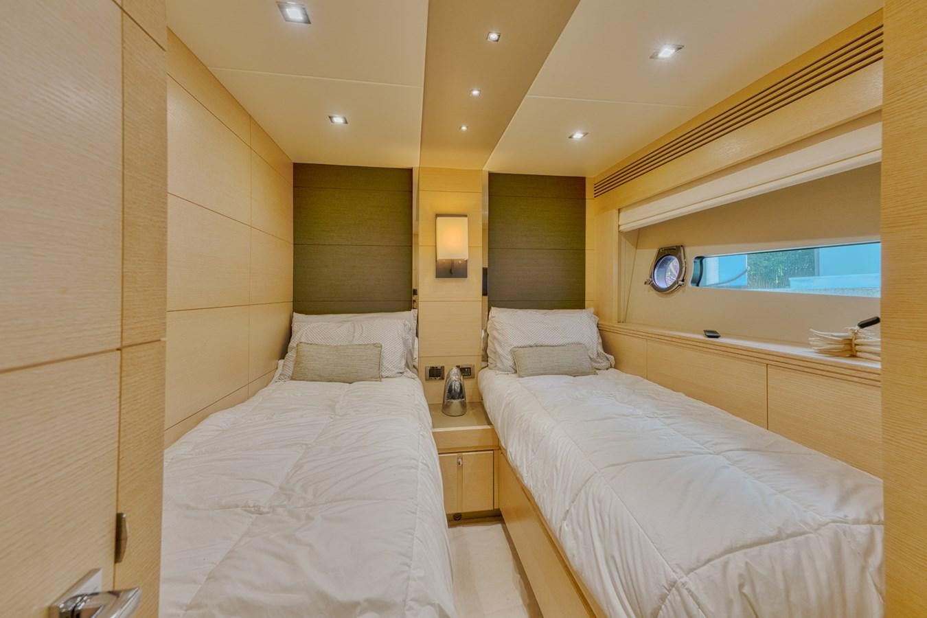 a room with two beds aboard MISS INGRID Yacht for Sale
