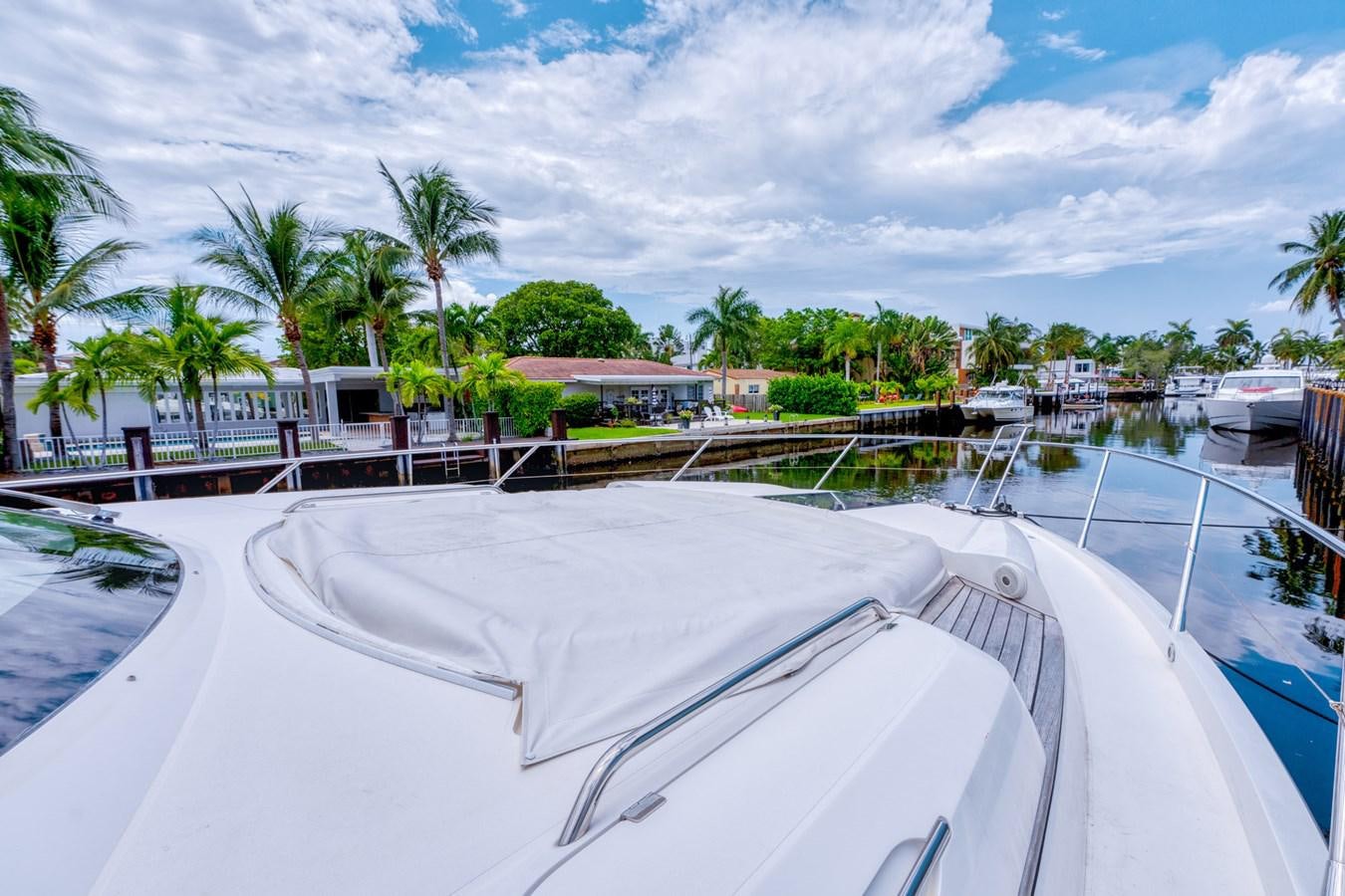 a pool with a building in the background aboard MISS INGRID Yacht for Sale
