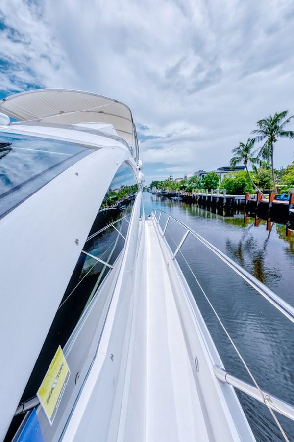 a white boat on a river aboard MISS INGRID Yacht for Sale
