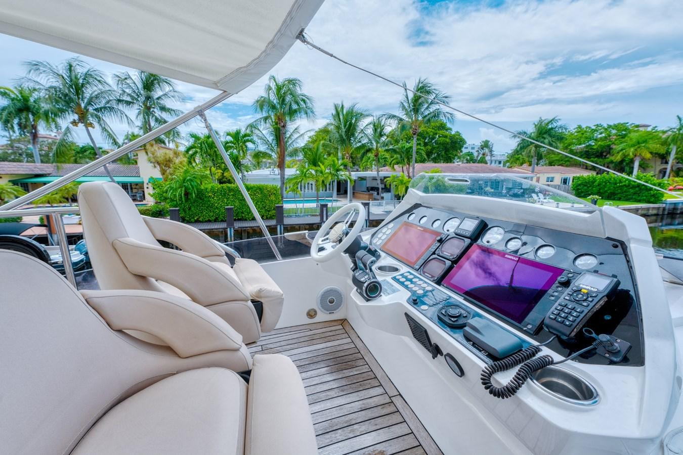 a car with a screen on the dashboard aboard MISS INGRID Yacht for Sale