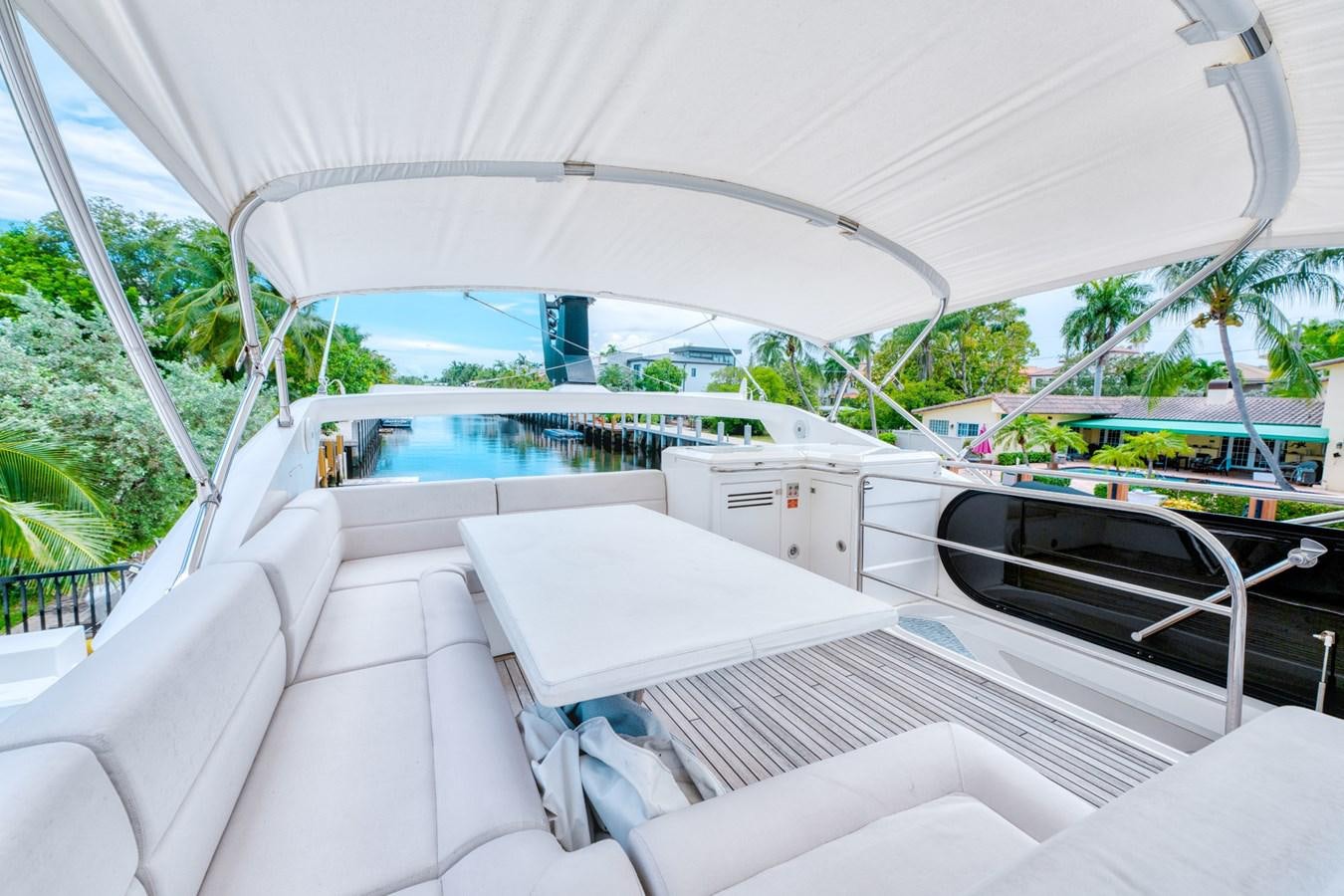a boat with a white canopy aboard MISS INGRID Yacht for Sale