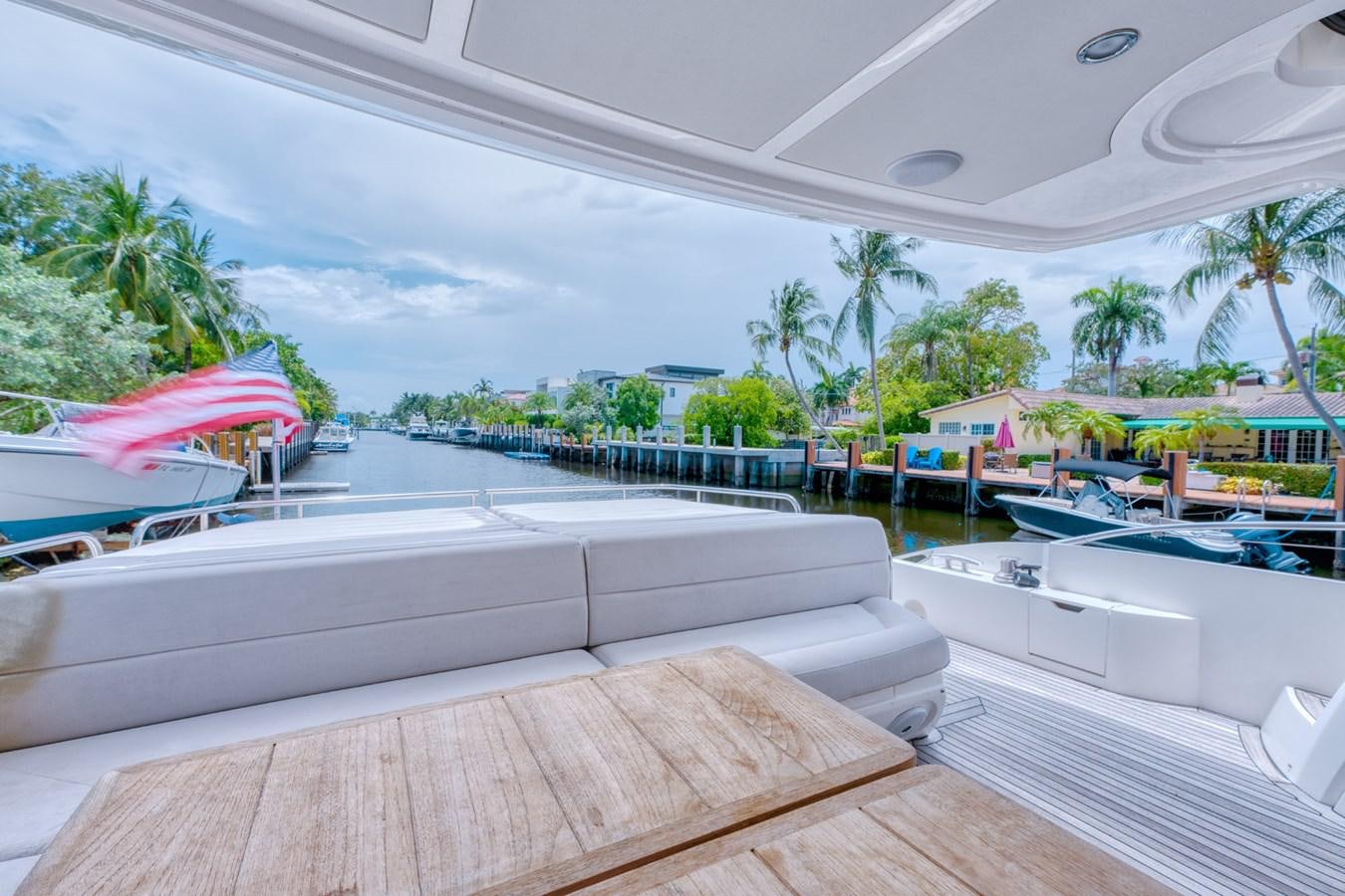 a pool with a deck and trees aboard MISS INGRID Yacht for Sale