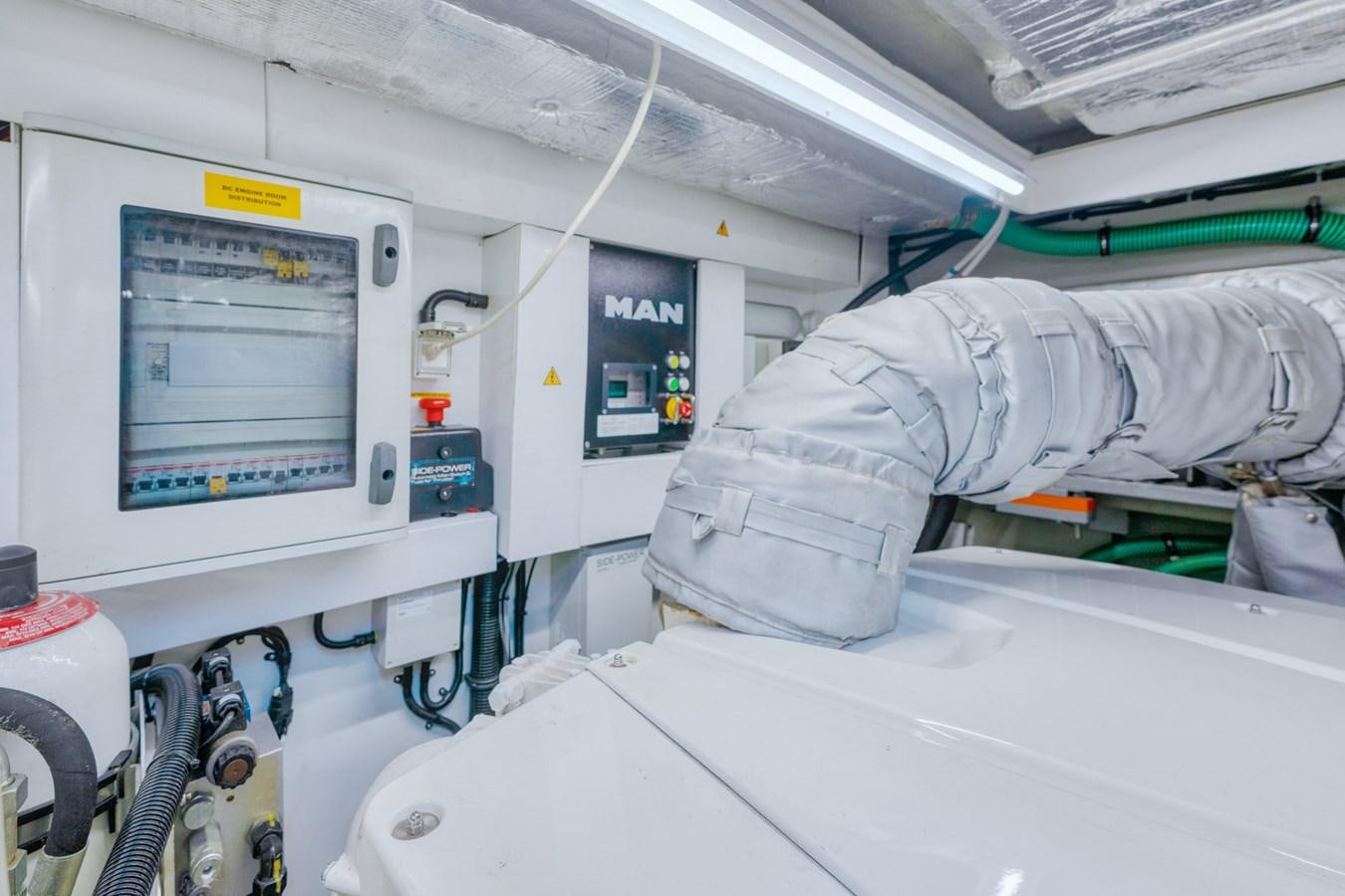 a person in a white suit aboard MISS INGRID Yacht for Sale