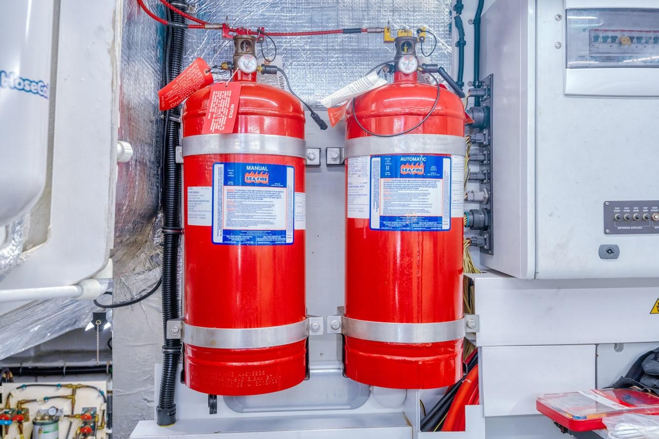 a red and white fire extinguisher aboard MISS INGRID Yacht for Sale