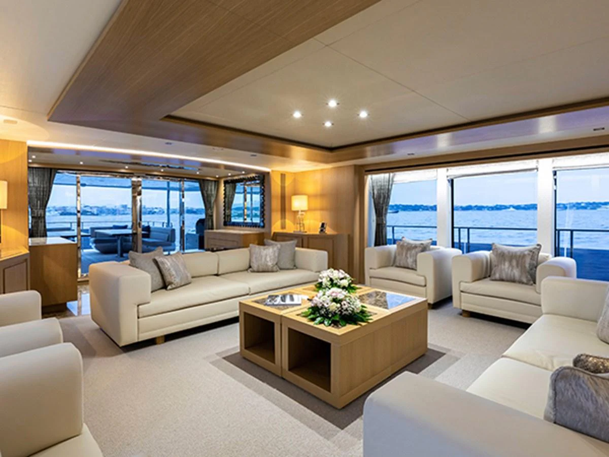 a living room with a large window aboard ELYSIUM Yacht for Sale
