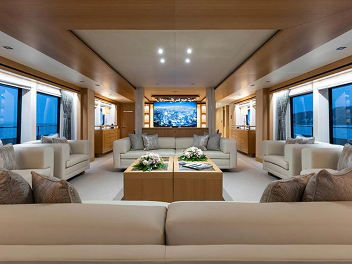 a living room with a large window aboard ELYSIUM Yacht for Sale