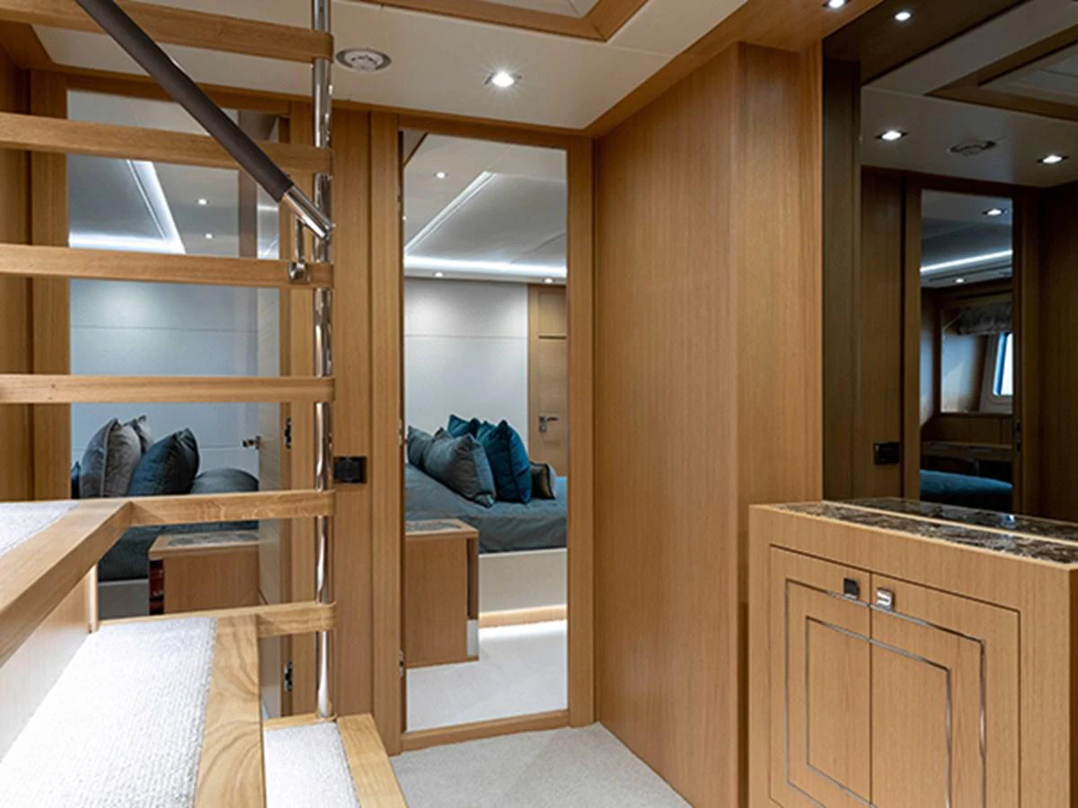 a room with bunk beds aboard ELYSIUM Yacht for Sale