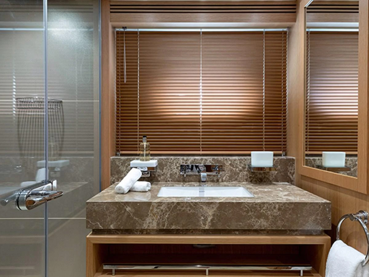 a bathroom with a countertop sink aboard ELYSIUM Yacht for Sale