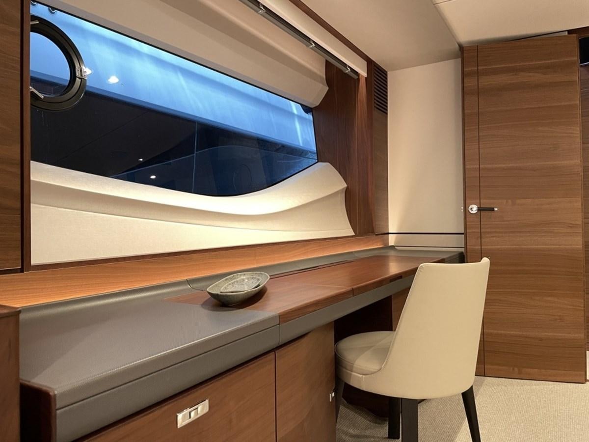 a desk with a tv on it aboard PRINCESS S78 Yacht for Sale