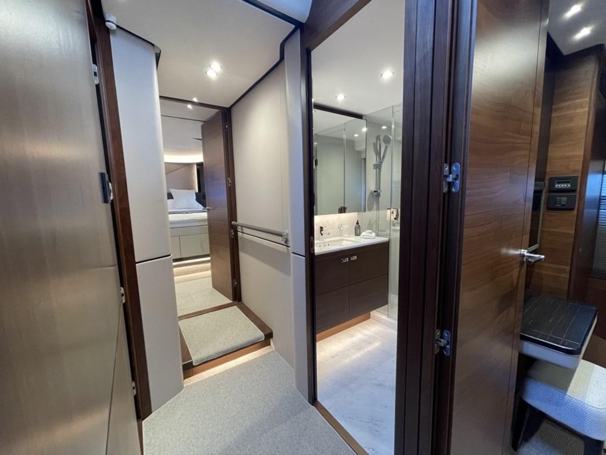 a room with a large mirror aboard PRINCESS S78 Yacht for Sale