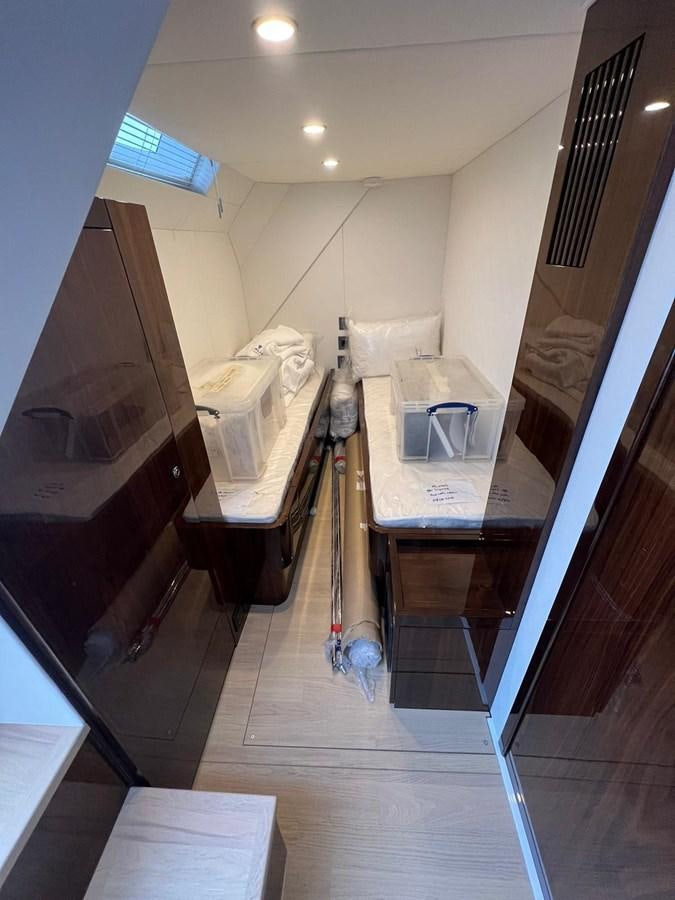 a room with a table and chairs aboard SQUADRON 68 Yacht for Sale