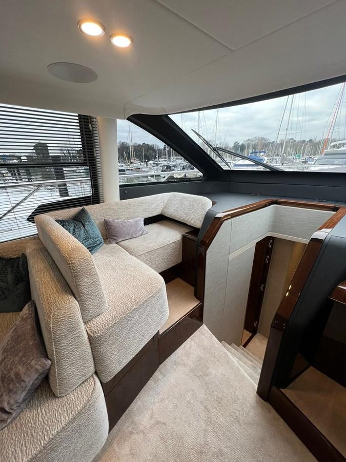 a room with a view of a city and water aboard SQUADRON 68 Yacht for Sale